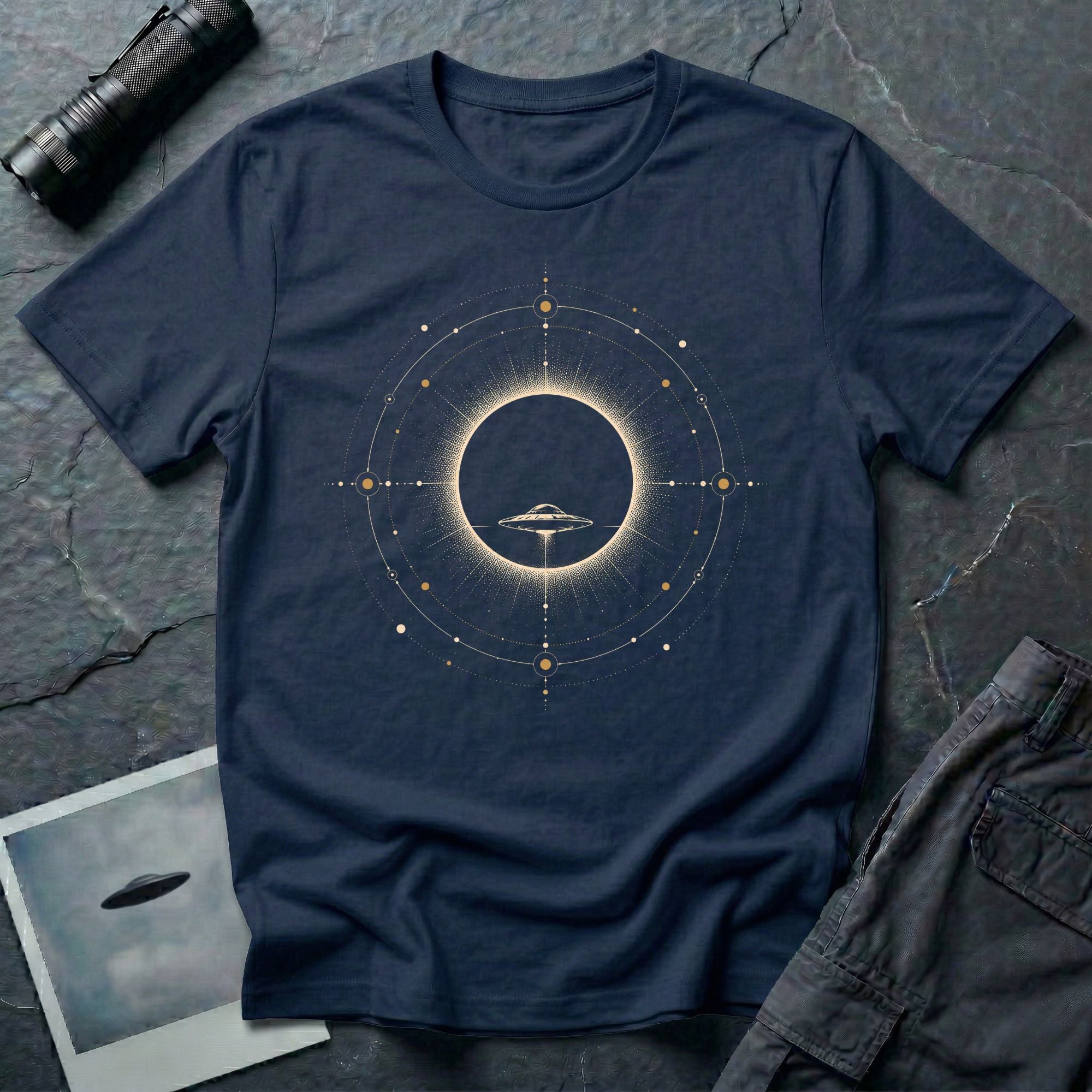 Navy blue UFO t-shirt with saucer silhouette inside solar eclipse and orbital sacred geometry design