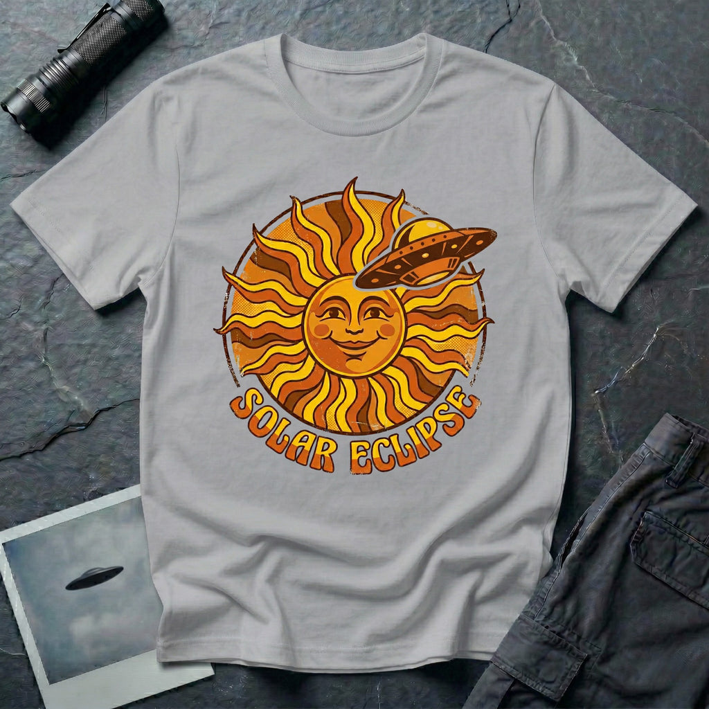 Solar Eclipse retro UFO t-shirt — smiling 1970s sun with flying saucer photobombing on grey unisex cotton tee