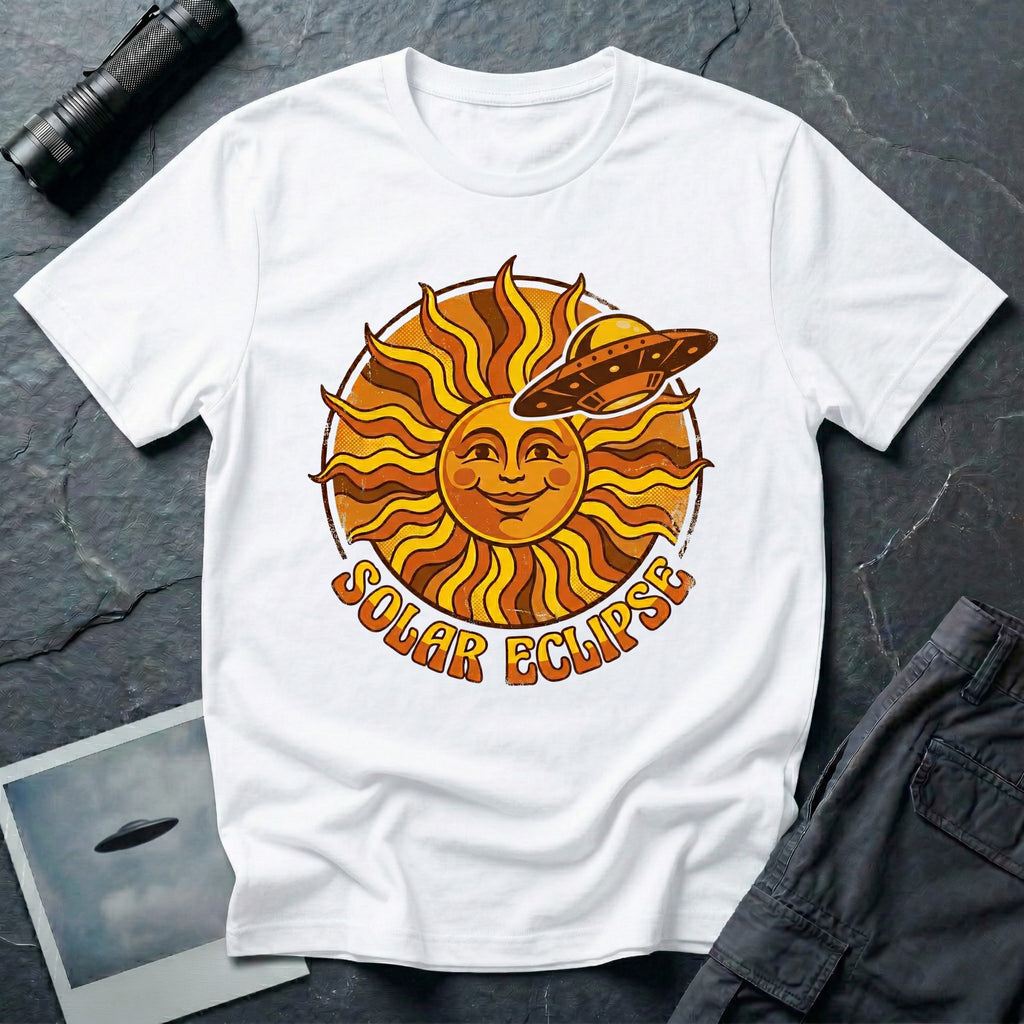 Solar Eclipse retro UFO t-shirt — smiling 1970s sun with flying saucer photobombing on white unisex cotton tee