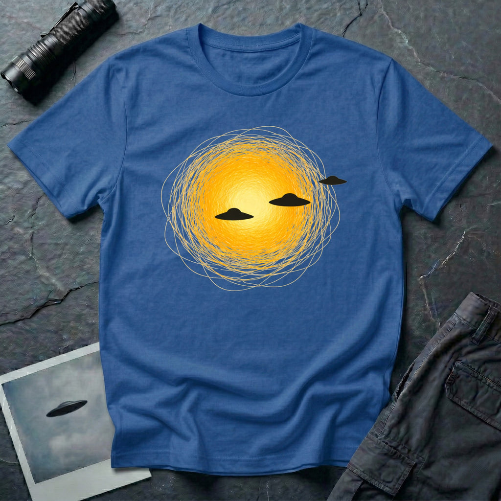 Solar Fly-by artistic UFO t-shirt — three black flying saucers passing across a glowing sun on blue unisex cotton tee