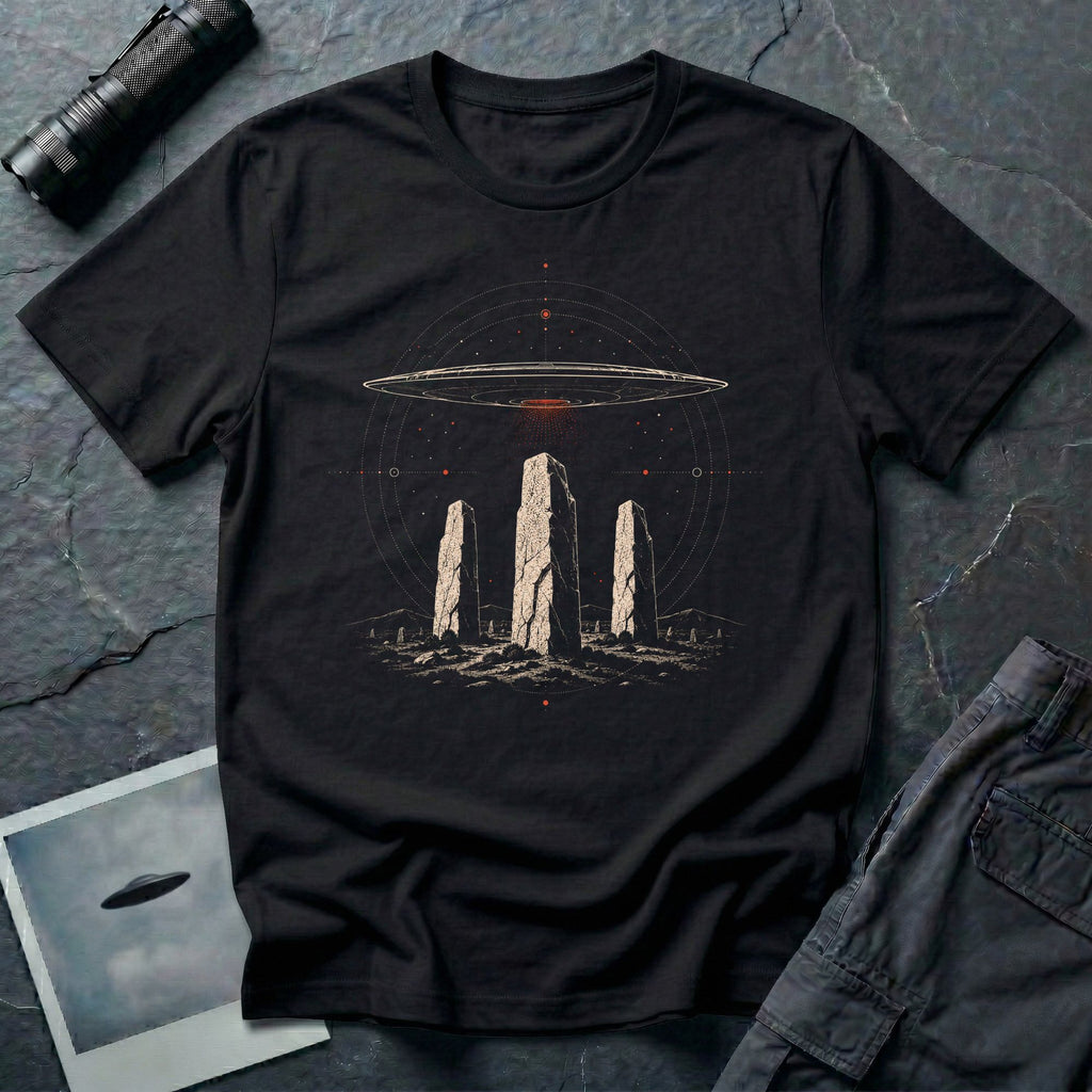 Black UFO t-shirt with saucer hovering above ancient standing stones and orbital sky design