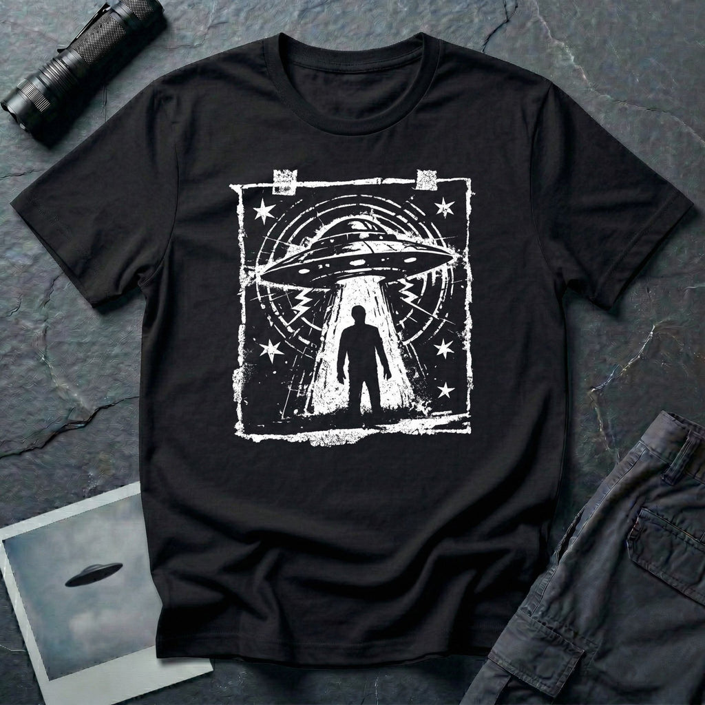 Black UFO t-shirt in styled as a distressed street flyer with saucer tractor beam and human silhouette