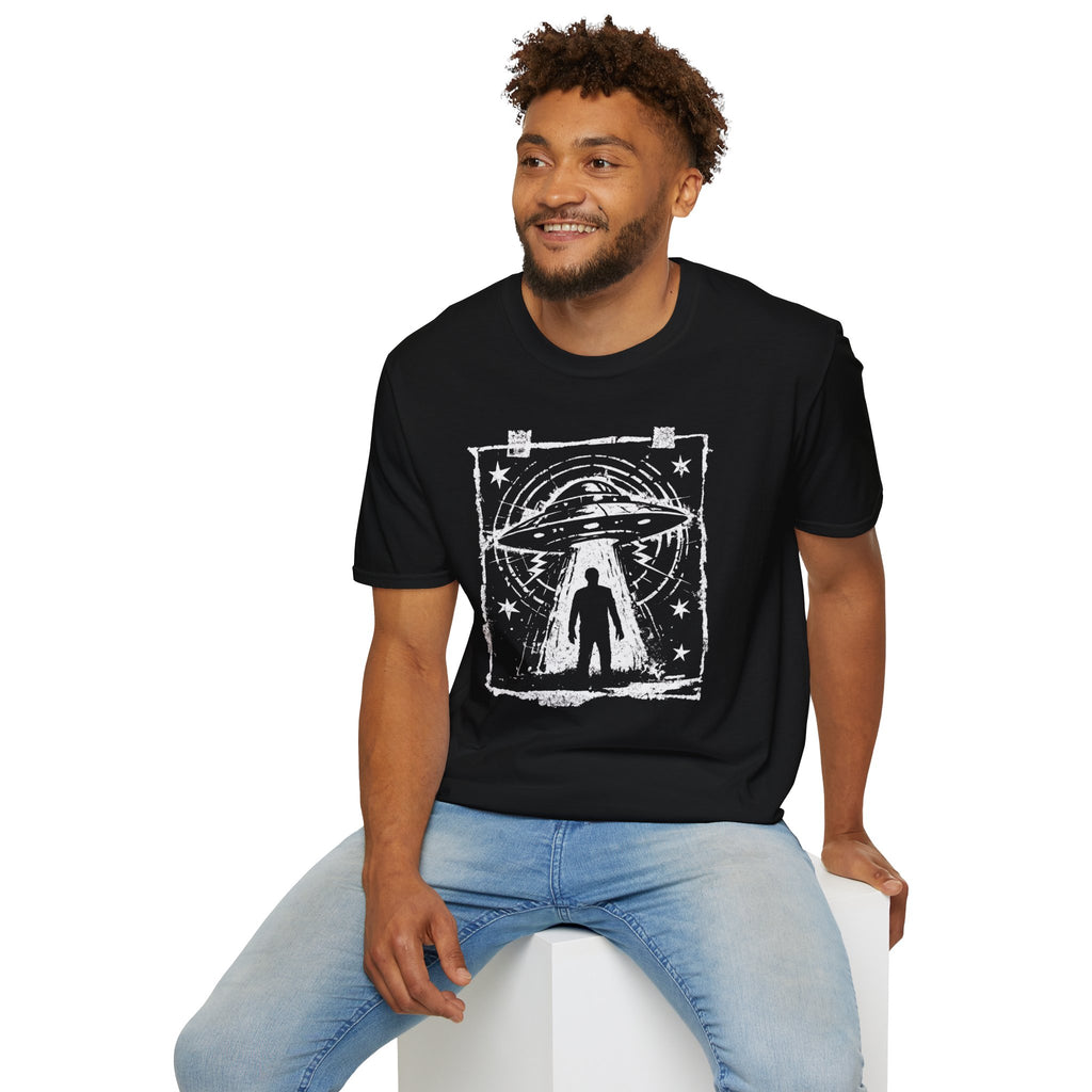 Man wearing black UFO t-shirt in styled as a distressed street flyer with saucer tractor beam and human silhouette