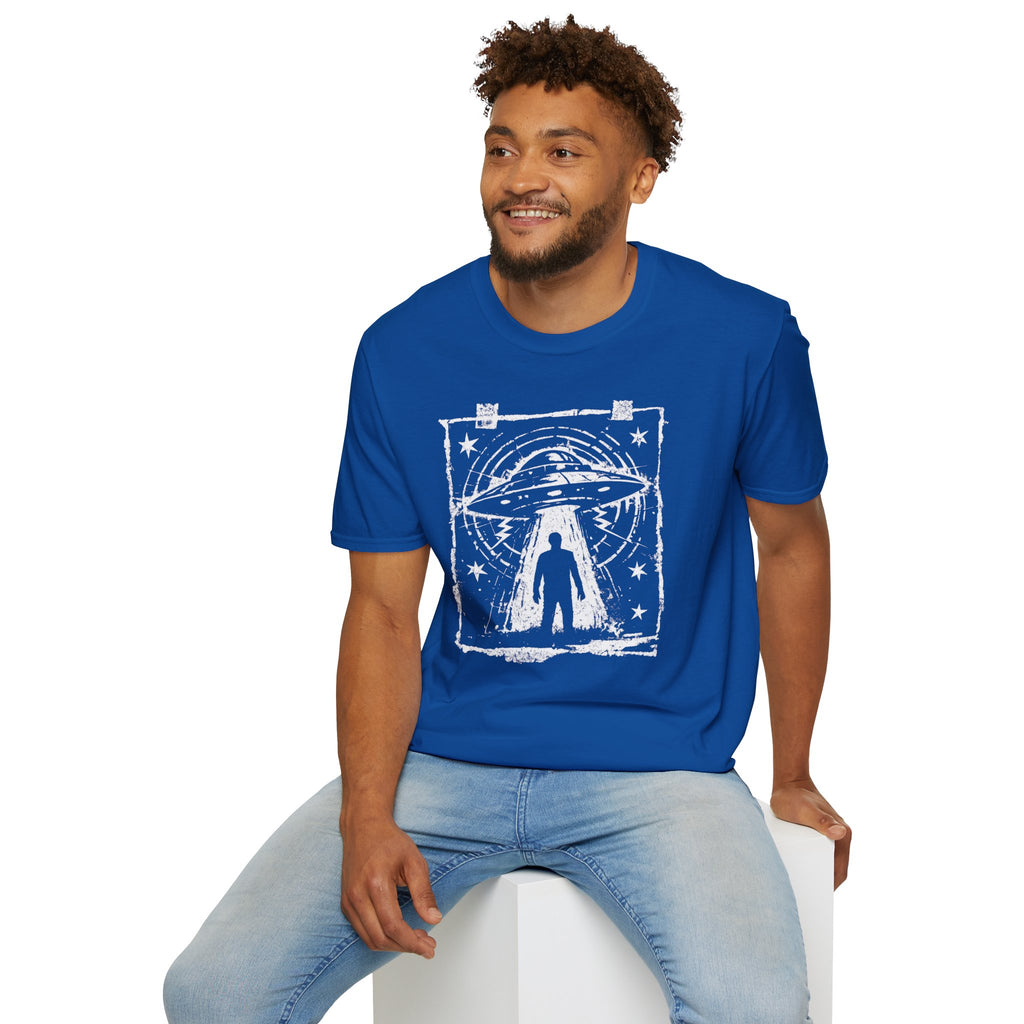 Man wearing blue UFO t-shirt featuring distressed street flyer design with saucer tractor beam and human silhouette