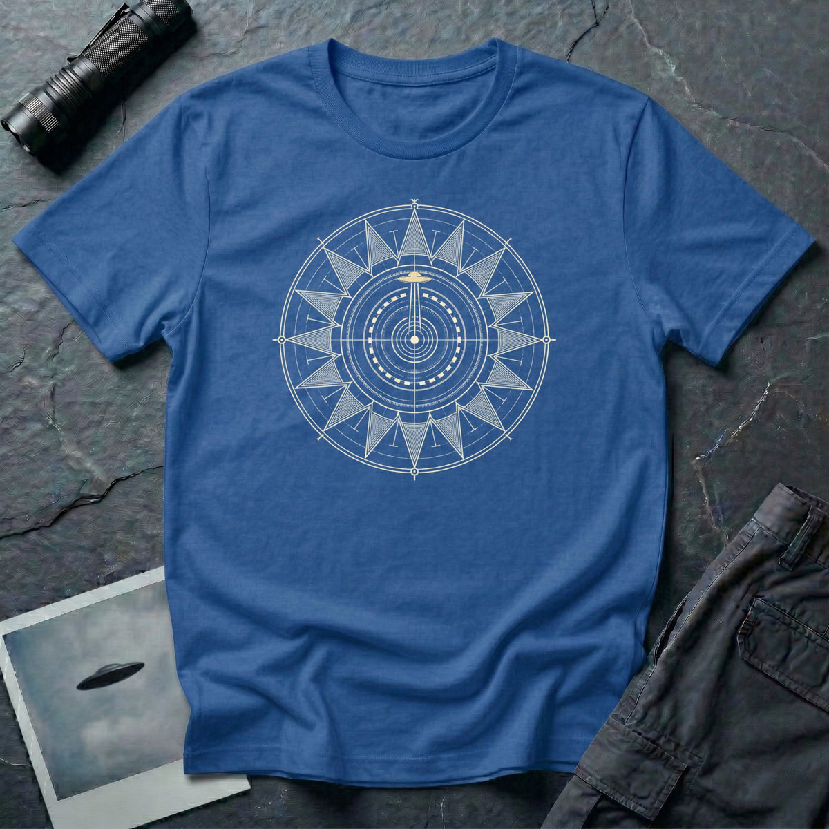 Royal blue t-shirt with cream radial sun wheel sacred geometry design and UFO at the centre