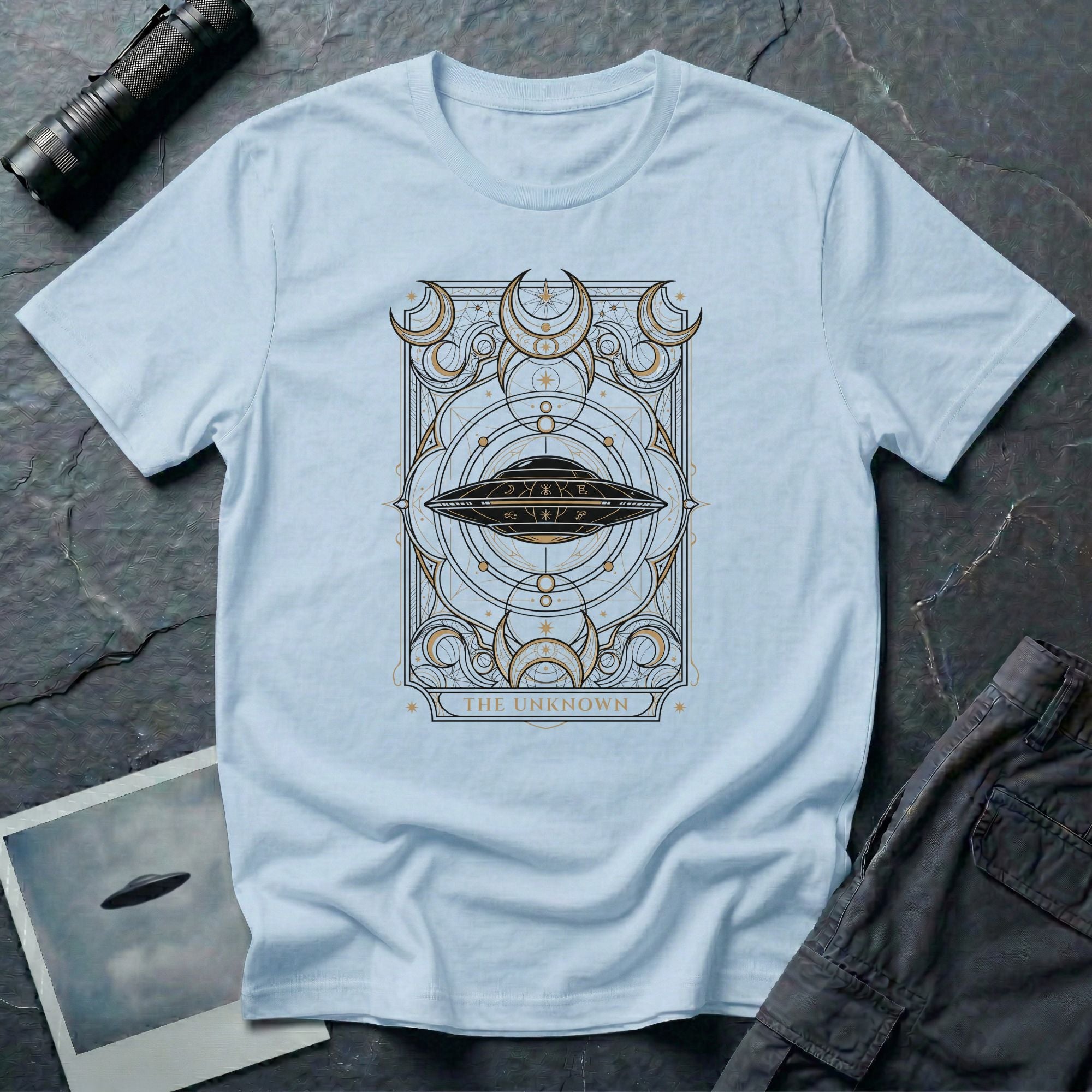 UFO tarot card light blue t-shirt with flying saucer surrounded by crescent moons and sacred geometry linework