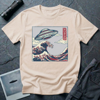 The Wave Japanese woodblock UFO t-shirt — flying saucer above Hokusai-style cresting wave in indigo and red on natural cotton tee