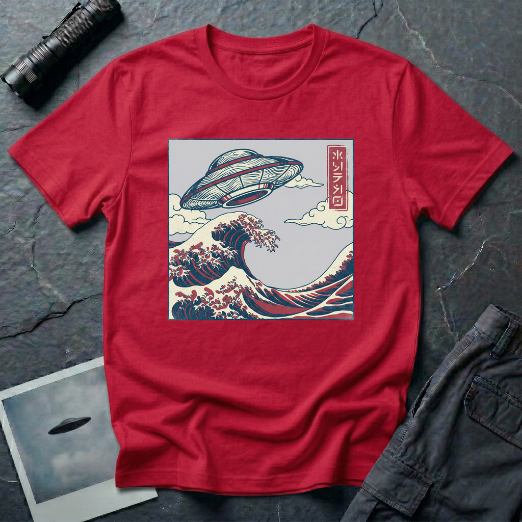 The Wave Japanese woodblock UFO t-shirt — flying saucer above Hokusai-style cresting wave in indigo and red on red cotton tee