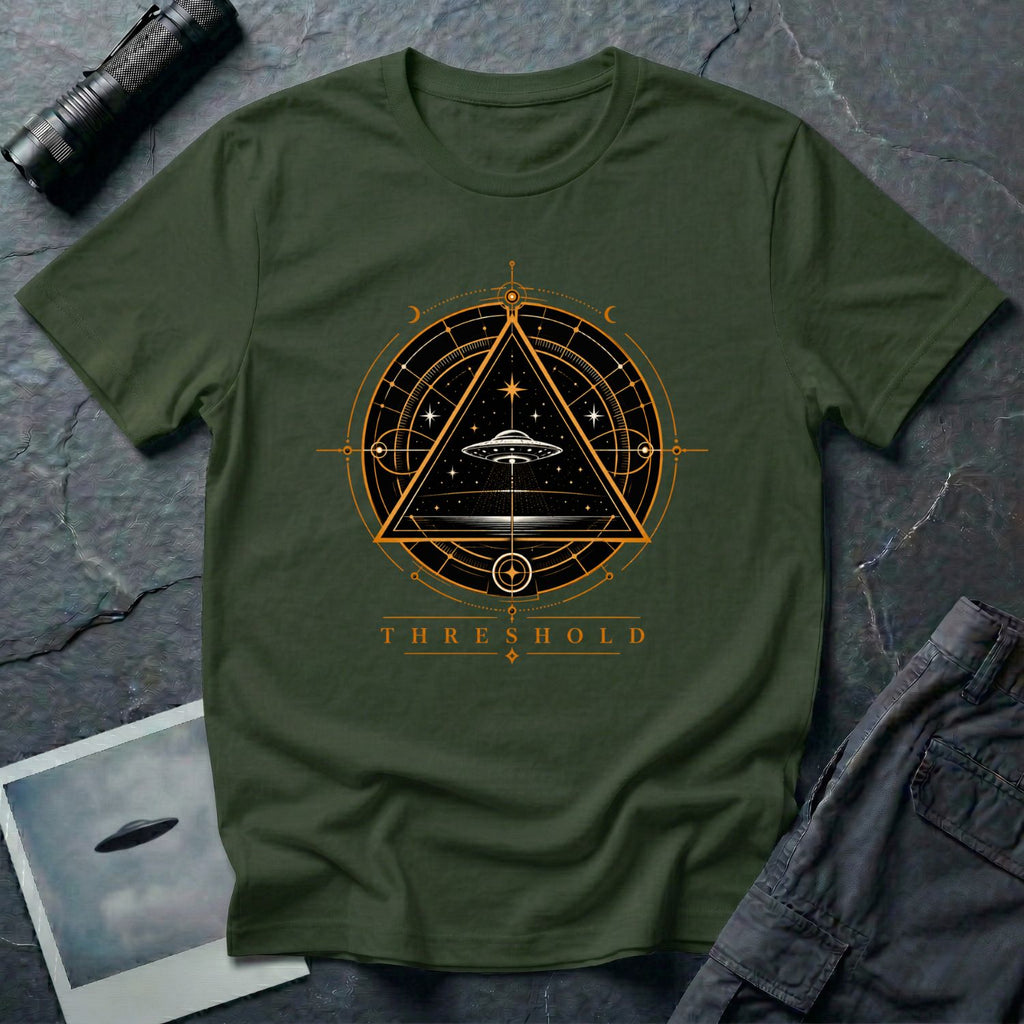 Military green UFO t-shirt with a flying saucer inside an upward-pointing triangle portal with perspective grid, crescent moons, and compass frame in gold and black with the word THRESHOLD