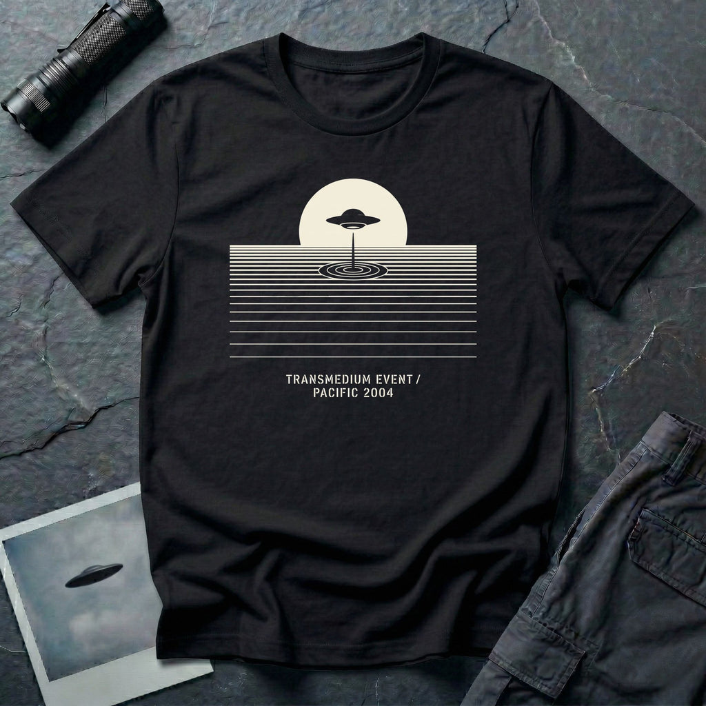 T-shirt with UFO above rippling ocean horizon lines and Transmedium Event Pacific 2004 caption, black