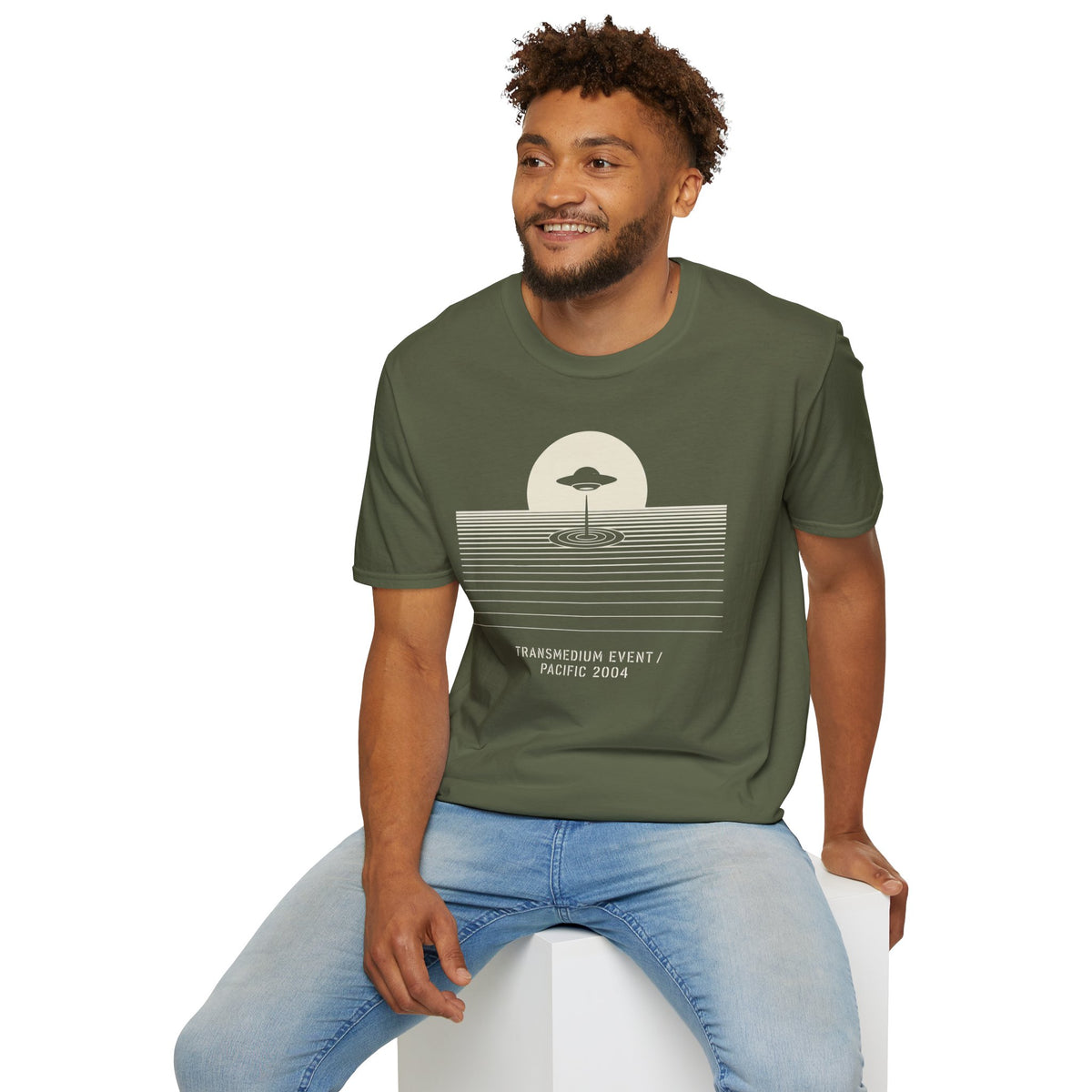 T-shirt with UFO above rippling ocean horizon lines and Transmedium Event Pacific 2004 caption, military green