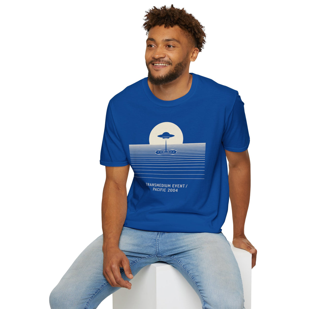T-shirt with UFO above rippling ocean horizon lines and Transmedium Event Pacific 2004 caption, royal blue