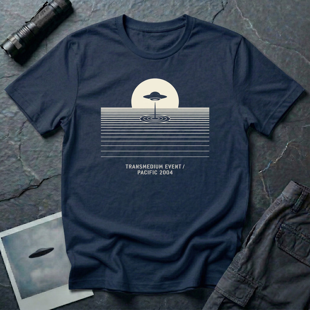 T-shirt with UFO above rippling ocean horizon lines and Transmedium Event Pacific 2004 caption, navy blue