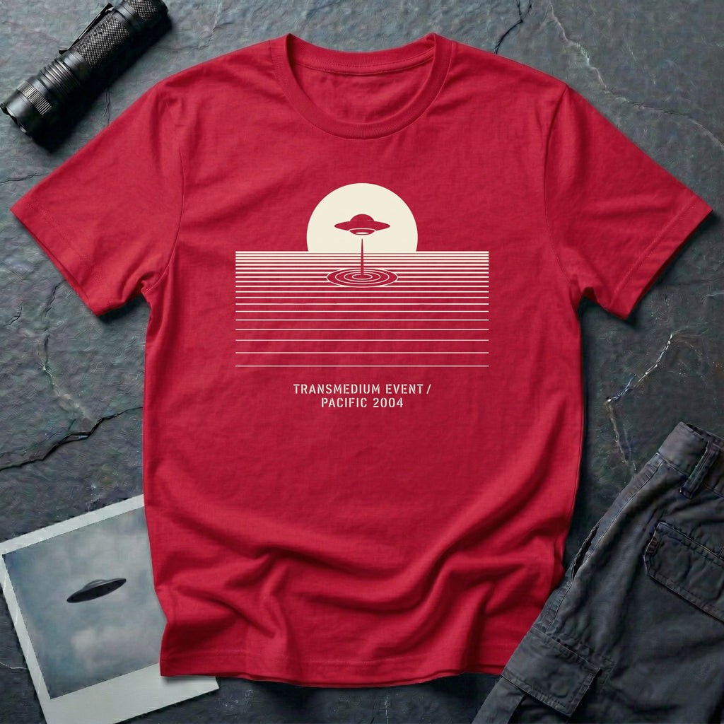 T-shirt with UFO above rippling ocean horizon lines and Transmedium Event Pacific 2004 caption, red