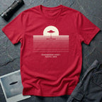 T-shirt with UFO above rippling ocean horizon lines and Transmedium Event Pacific 2004 caption, red