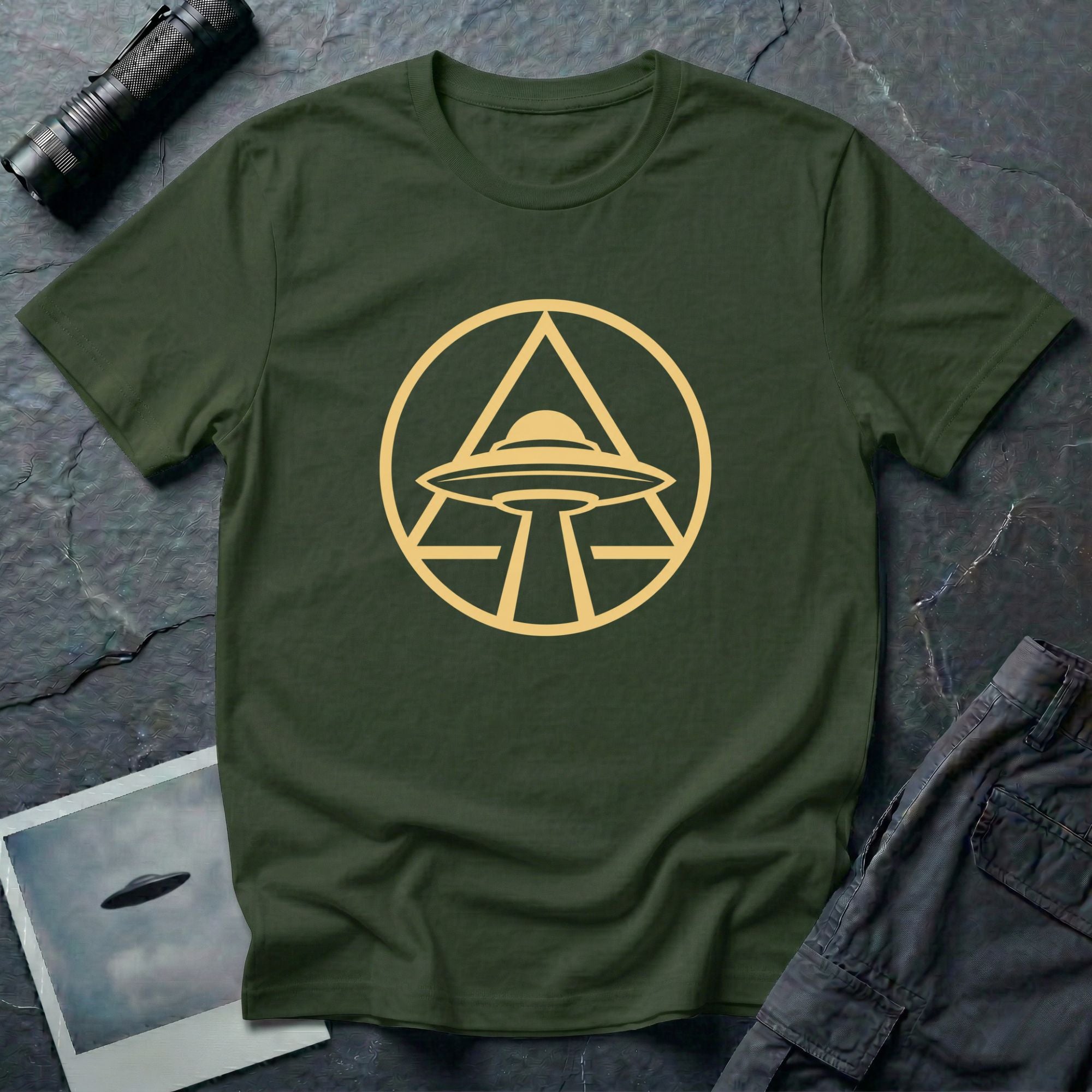 UFO apex t-shirt with gold geometric emblem of a saucer beaming light inside a triangle and circle, green