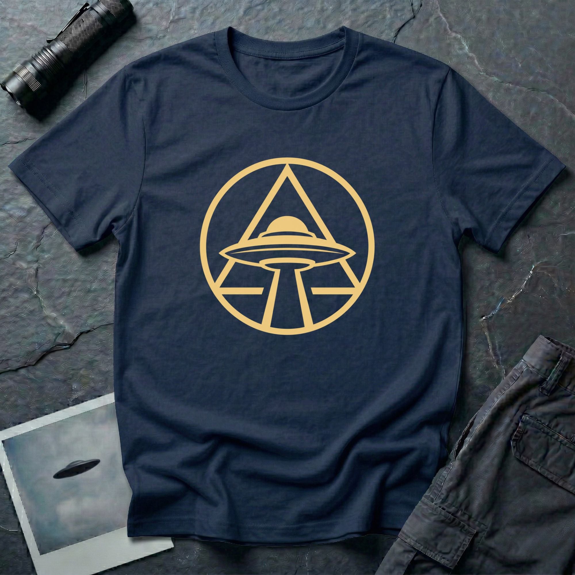 UFO apex t-shirt with gold geometric emblem of a saucer beaming light inside a triangle and circle, navy blue