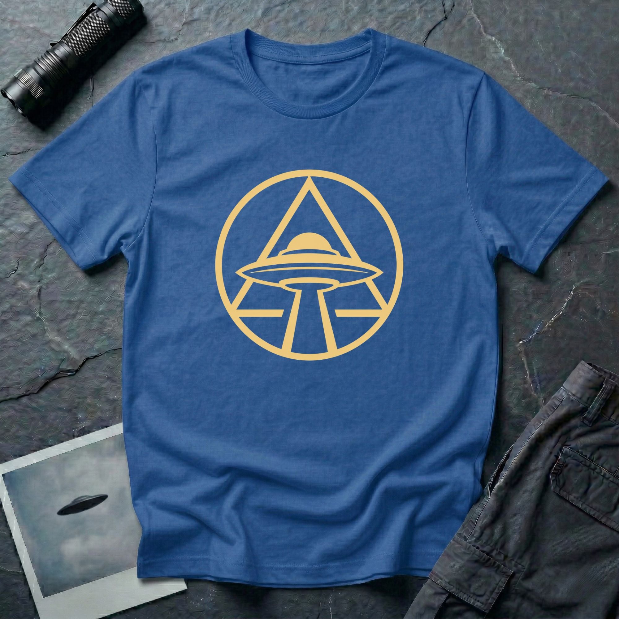 UFO apex t-shirt with gold geometric emblem of a saucer beaming light inside a triangle and circle, royal blue
