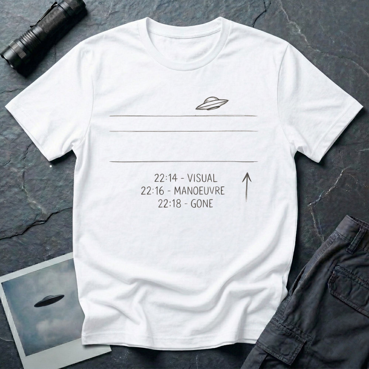 White t-shirt with hand drawn UFO and sighting log reading 22:14 visual, 22:16 manoeuvre, 22:18 gone