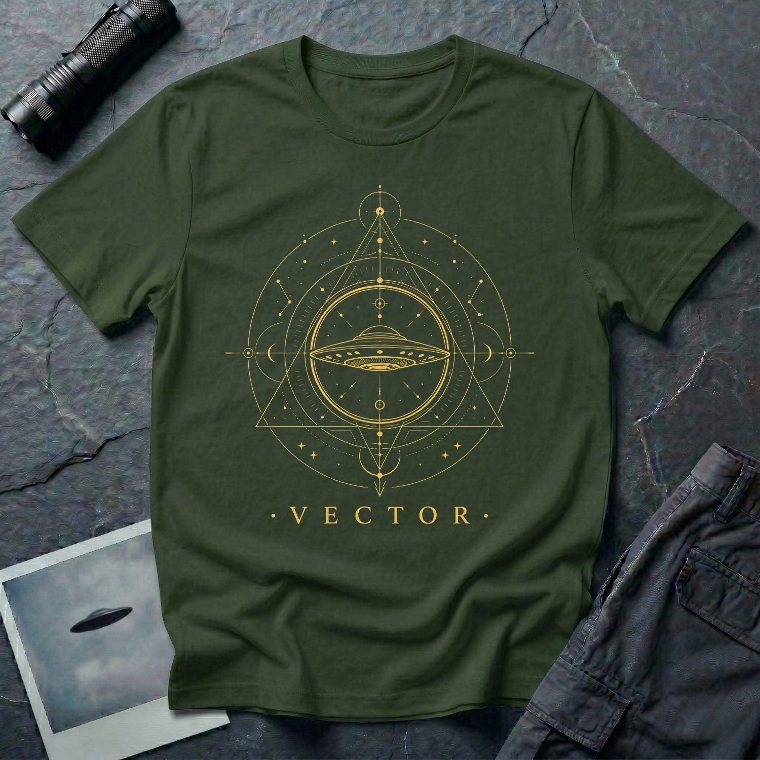 Military green UFO t-shirt with a flying saucer inside an upward-pointing sacred geometry triangle with compass points and crescent moons in gold with the word VECTOR beneath