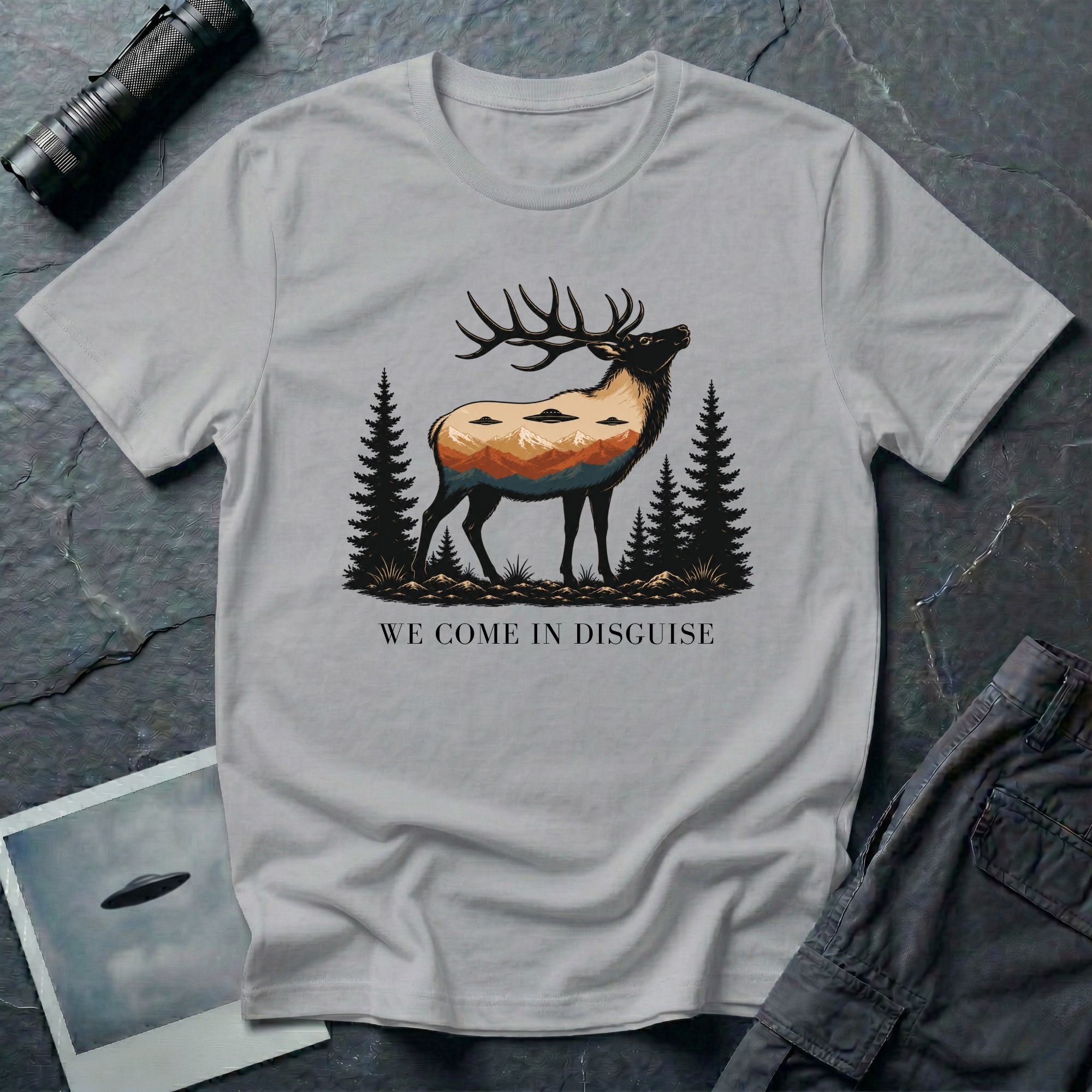 We Come in Disguise UFO t-shirt with deer double exposure hiding three saucers in mountain skyline, grey