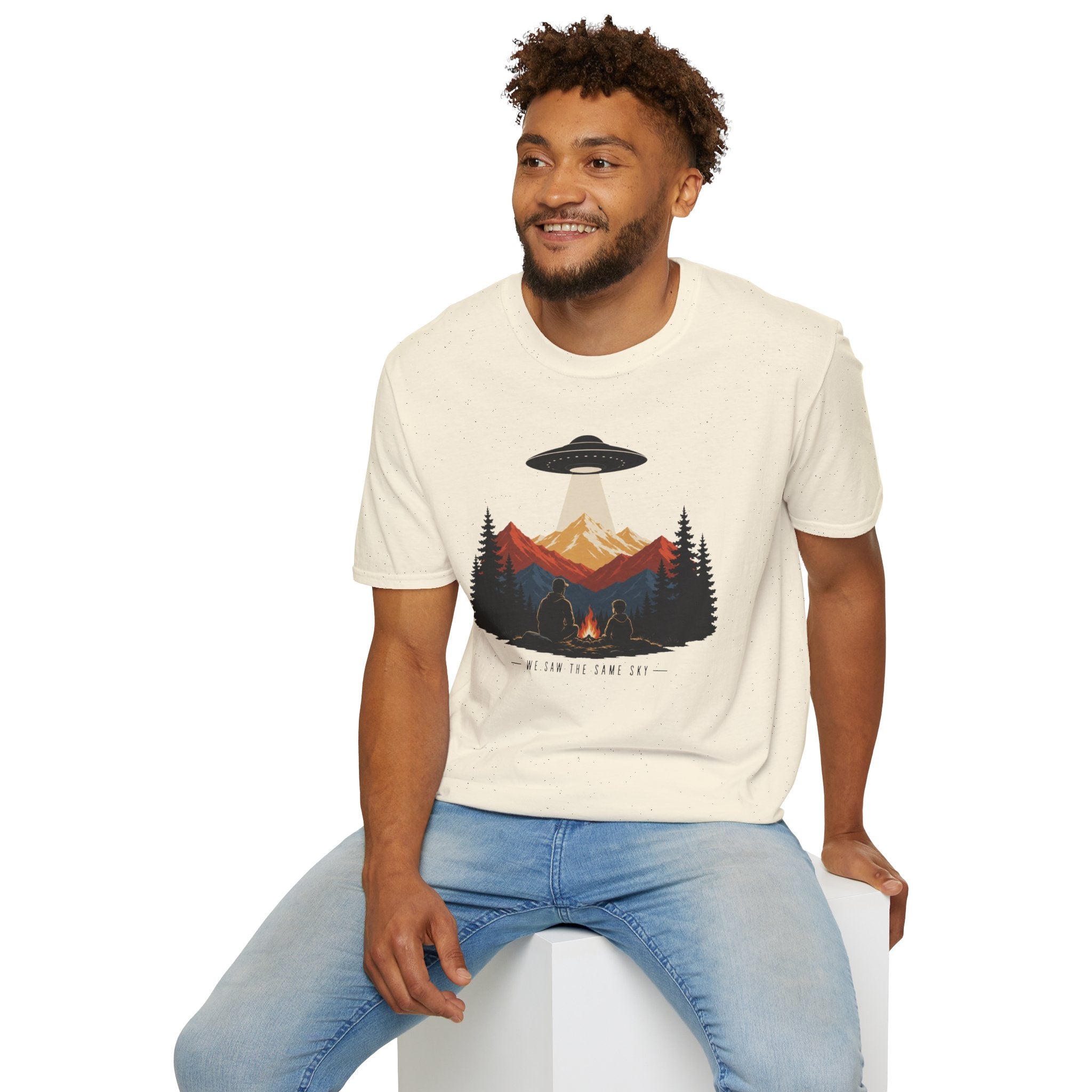 We Saw the Same Sky UFO t-shirt with father and child at campfire watching saucer over mountains, natural