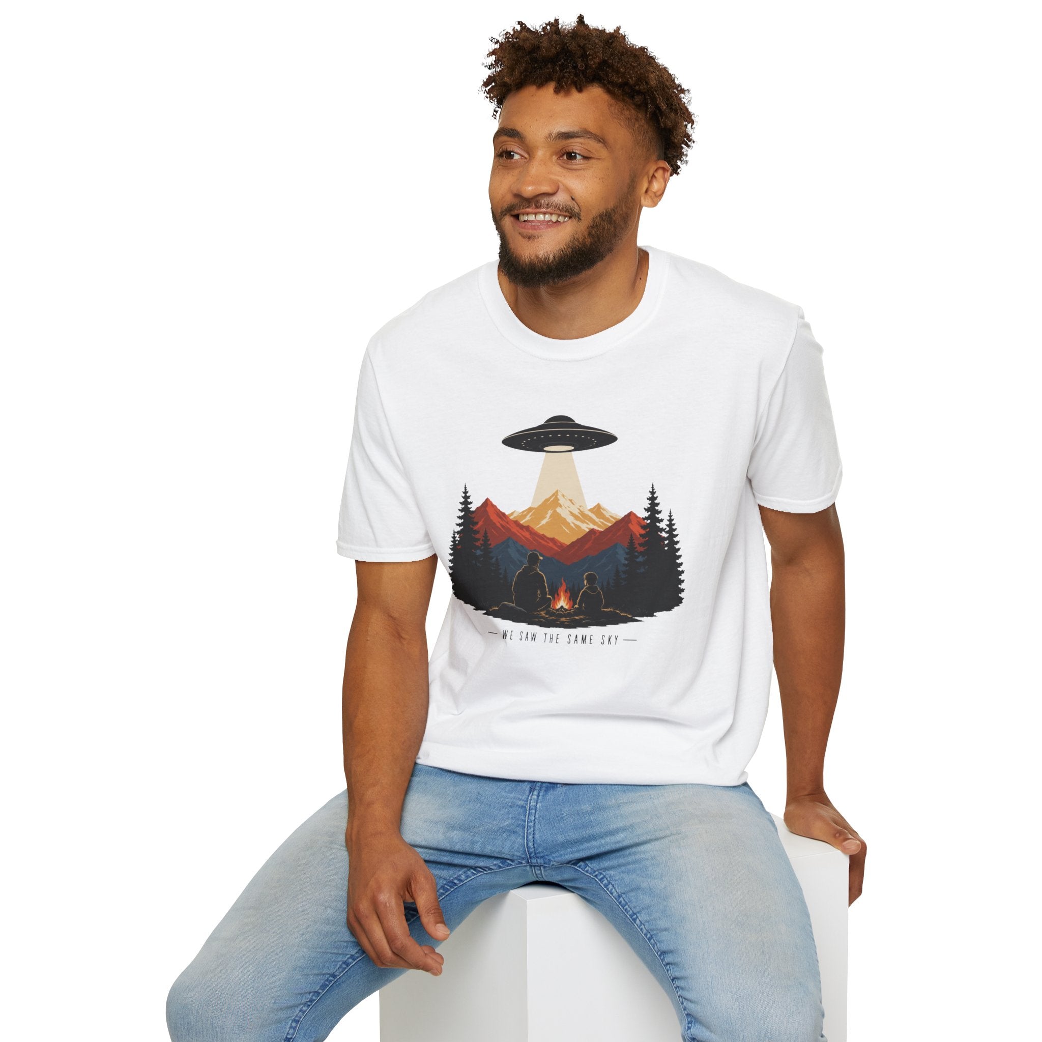 We Saw the Same Sky UFO t-shirt with father and child at campfire watching saucer over mountains, white