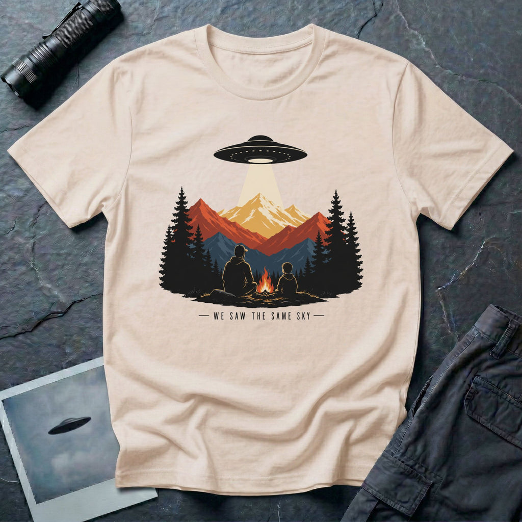 We Saw the Same Sky UFO t-shirt with father and child at campfire watching saucer over mountains, natural